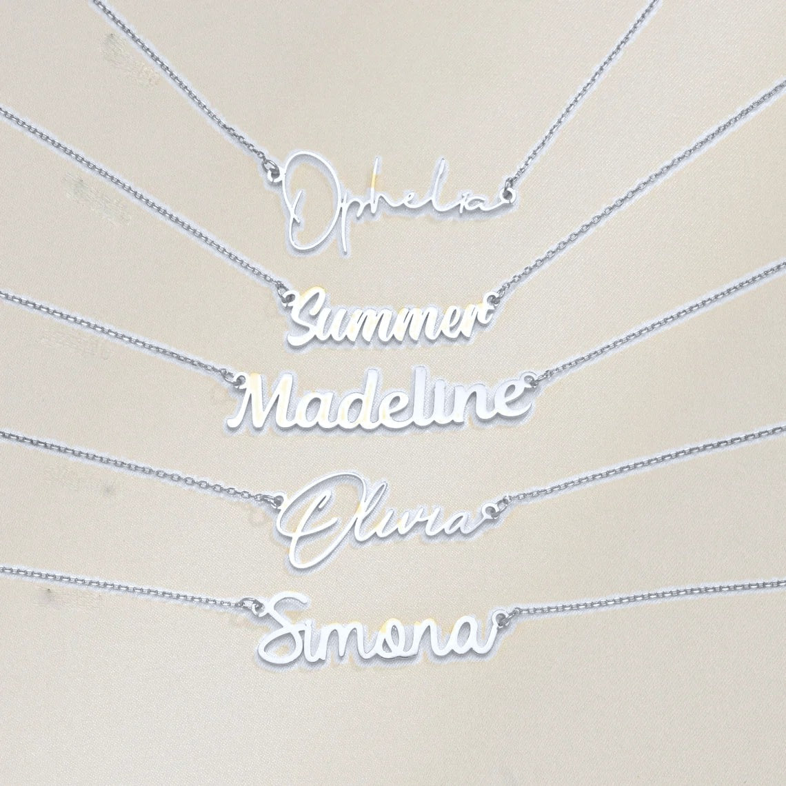 Silver name necklaces (colour adjusted in the photo)