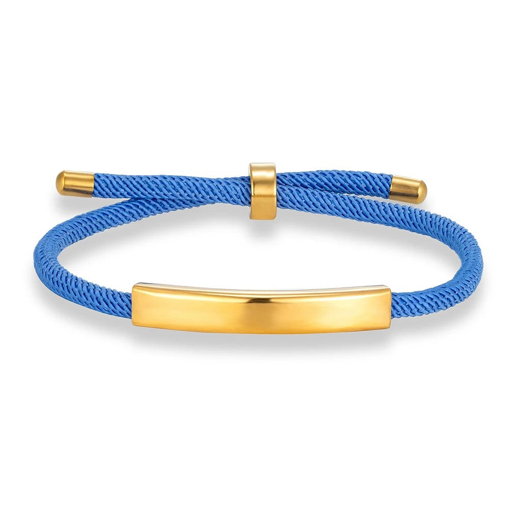 Pulsera de cordón azul con la placa para grabar