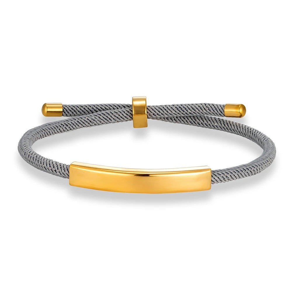 Pulsera de cordón gris con la placa para grabar